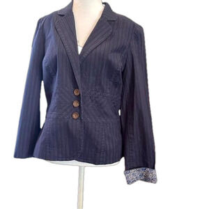 Tape Measure sz 8 denim light shoulder pad fitted jean jacket with cuff accents.